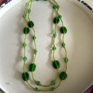 Green bead necklace.